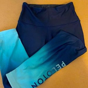 WITH Peloton high rise faded carpi.